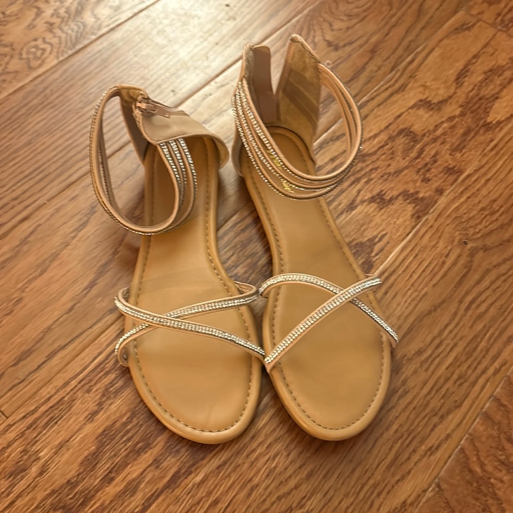 Sparkly tan sandals.